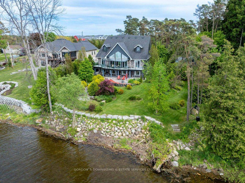 Welcome to this stunning 10 year old executive waterfront home on the Bay of Quinte, superbly designed with modern comfort in mind.