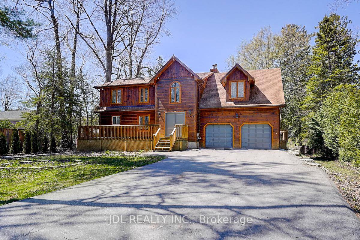 Stunning Four Season Riverside Retreat in Wasaga Beach !