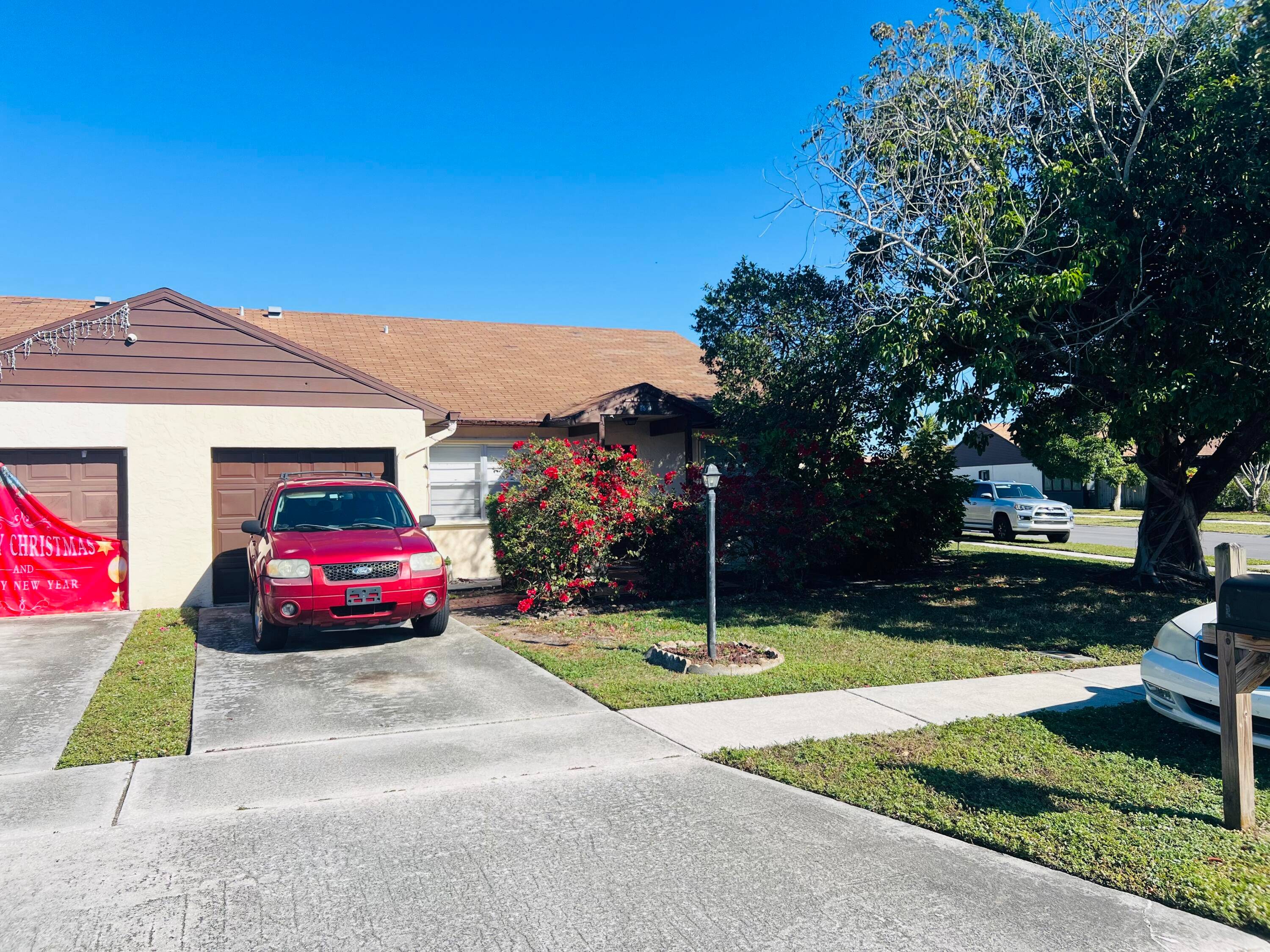 Spacious 3 bedroom, 2 bathroom townhouse featuring a one car garage and a generous screened patio, perfect for outdoor relaxation.