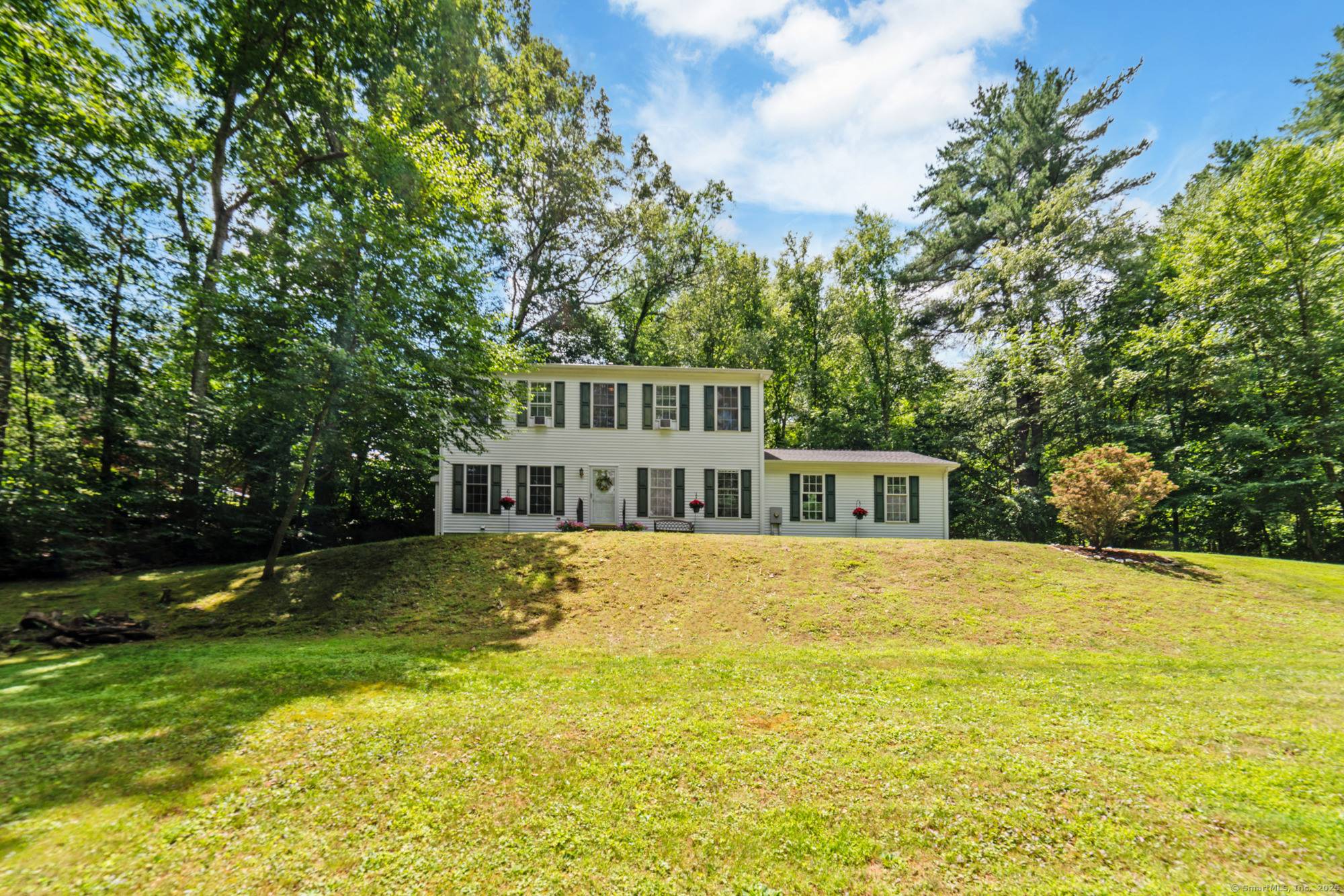 Tucked away on a peaceful cul de sac near the Woodbury Bethlehem town line, this beautiful 4 bedroom, 2.