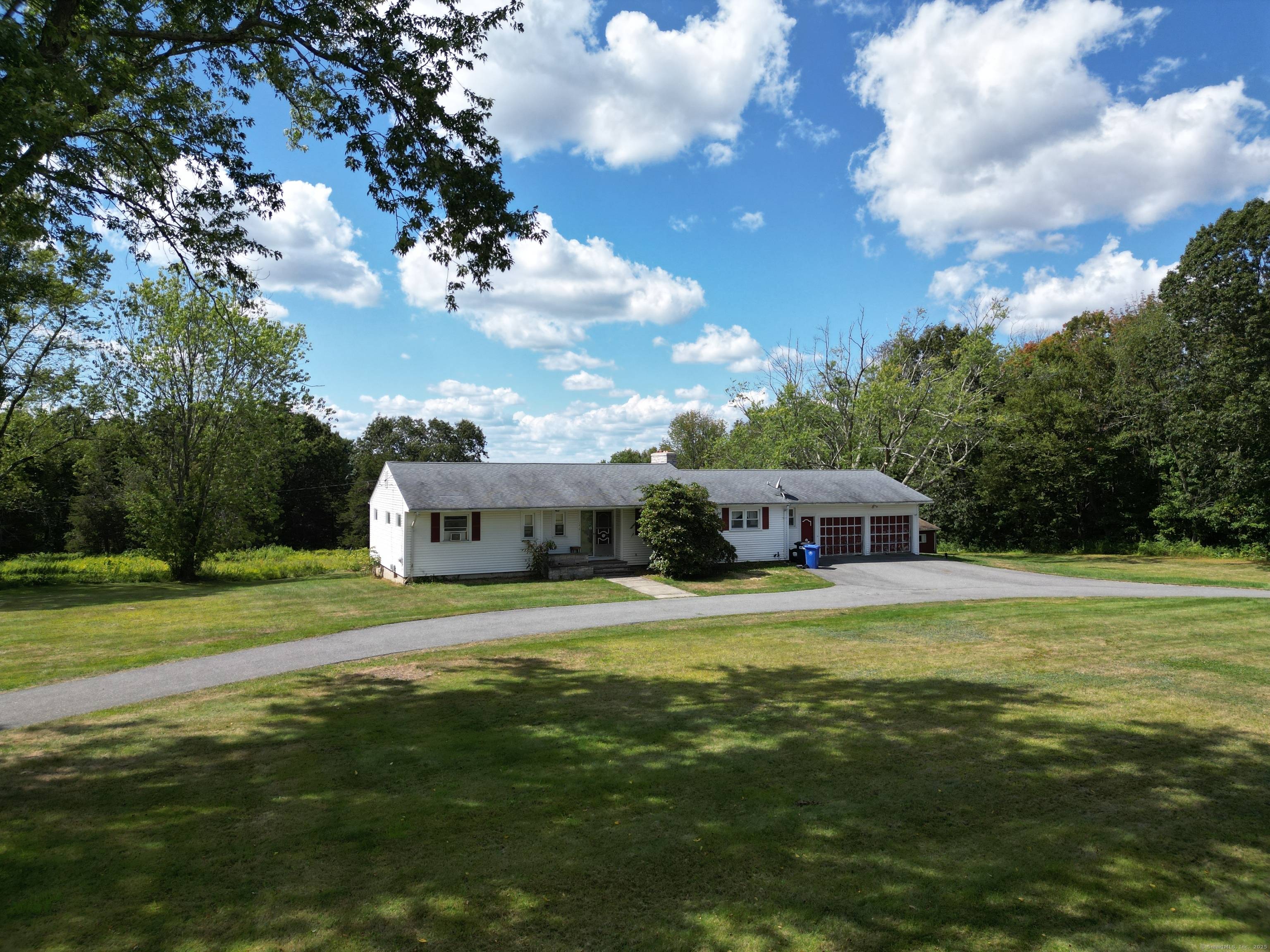 Killingly PRESTIGE LOCATION with 38 Acres on NORTH ROAD with BREATHTAKING VIEWS from this AMAZING property consisting of 38 Acres of land with a home, a POND and a shed.