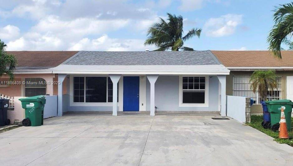 Beautiful remodeled 2 bedroom, 1 bath townhouse with a patio, laundry, 3 parking spaces, and NO HOA.
