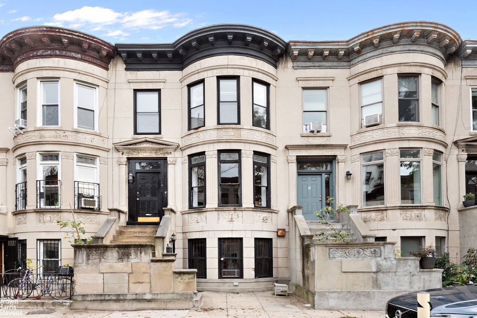 8 Parkside Court is a 20' wide limestone townhome on a serene private street where every house gets its own parking spot !