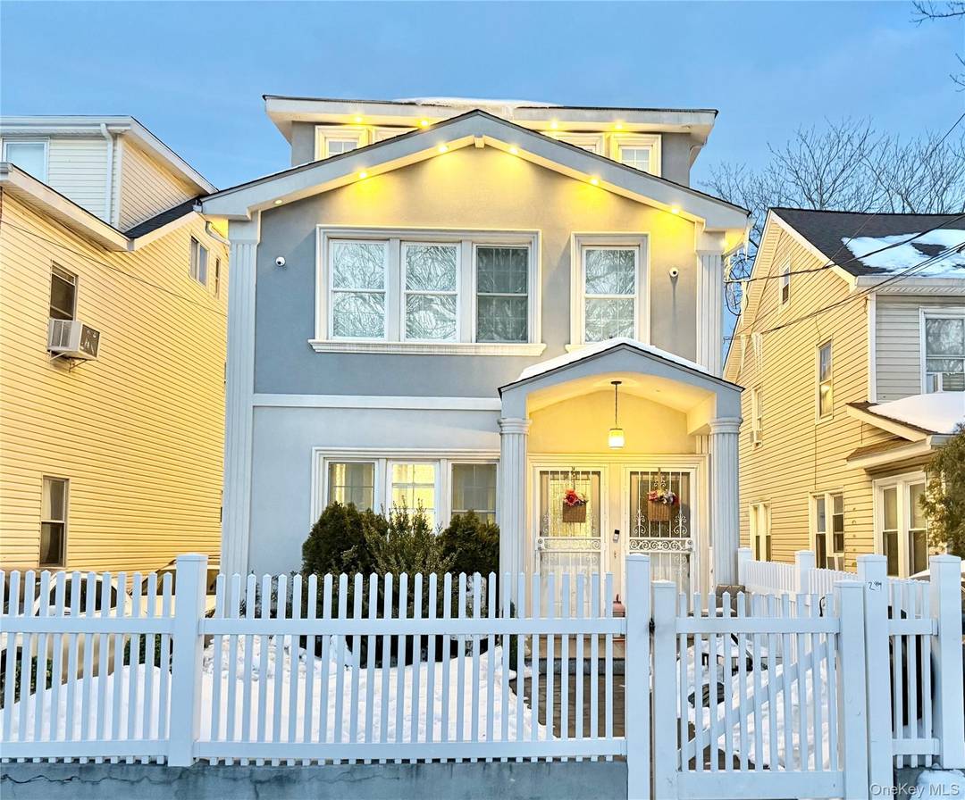 Spacious, stylish, and truly move in ready, this standout two family home offers an exceptional layout and beautiful curb appeal.