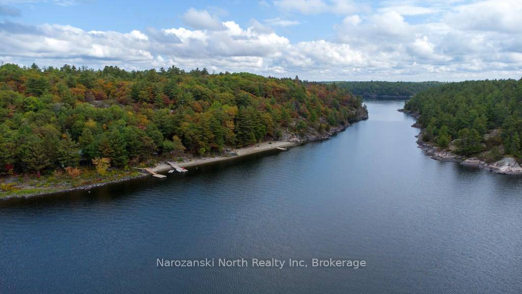 This spectacular property is nestled against the breathtaking backdrop of 4 Mile Island and graced by the pristine waters of the Lower French River.