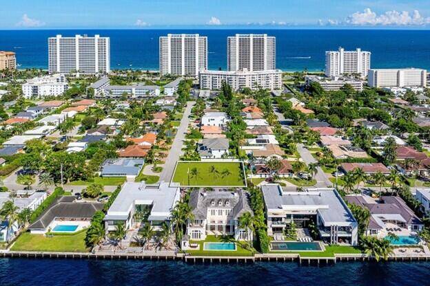 Perfect, well sought after, Boca Luxury Life Style, Corner Large Lot in the Exclusive Section of Spanish River Lands.
