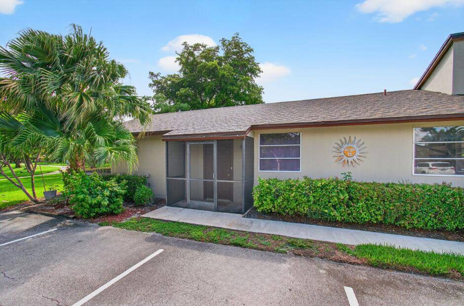 Welcome to your serene lakefront retreat in the heart of West Boca Raton !