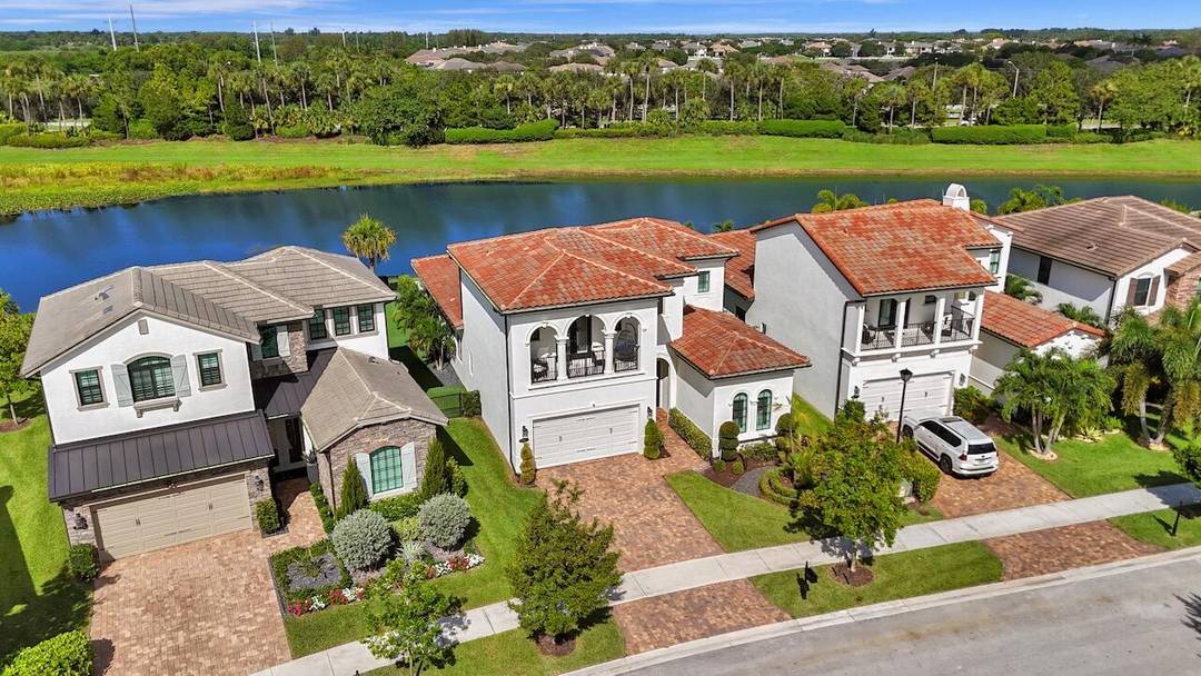 Welcome to this stunning Provence B Model in the gated community of Palm Meadows Estates.