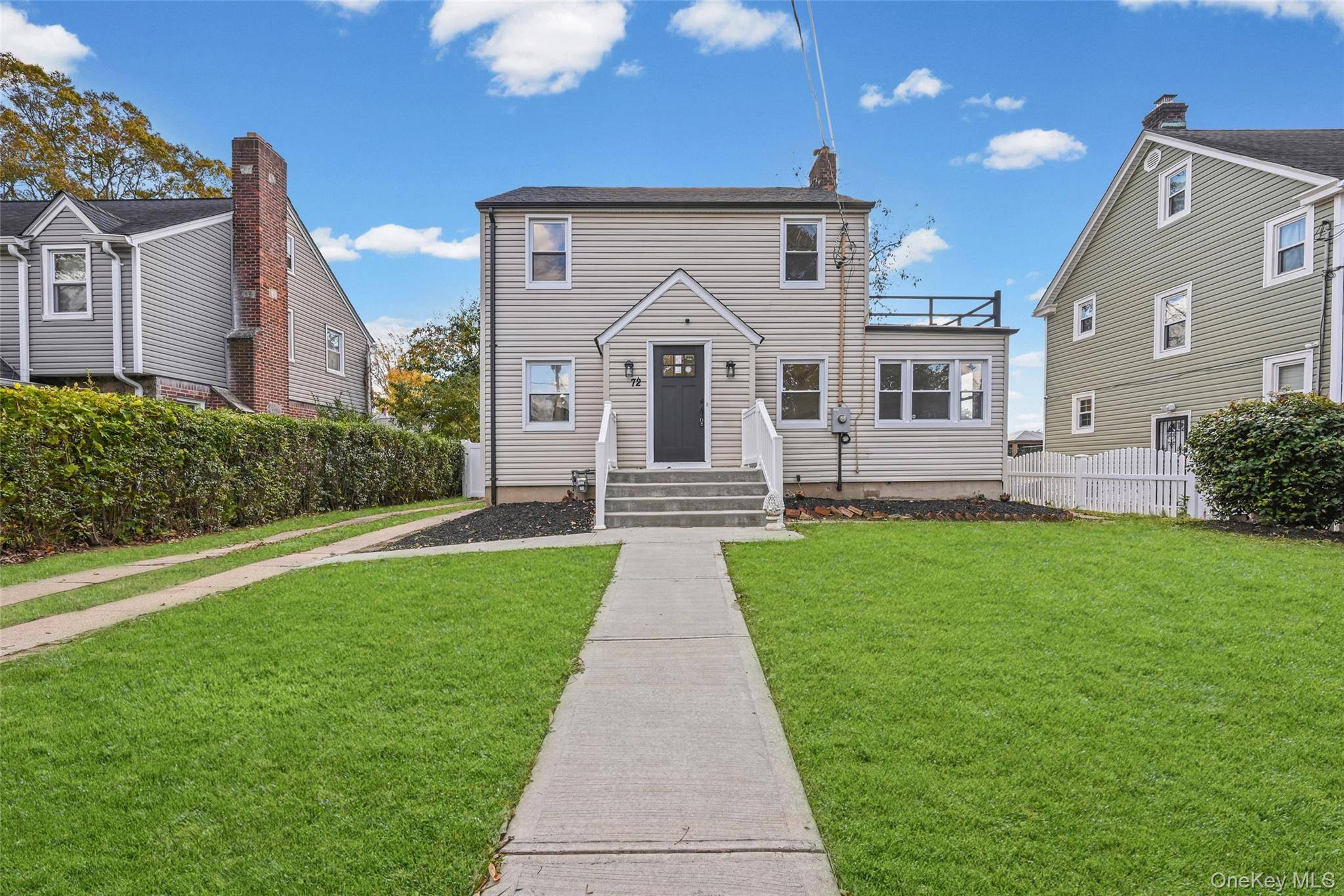Welcome to this Beautifully Renovated Colonial Home !