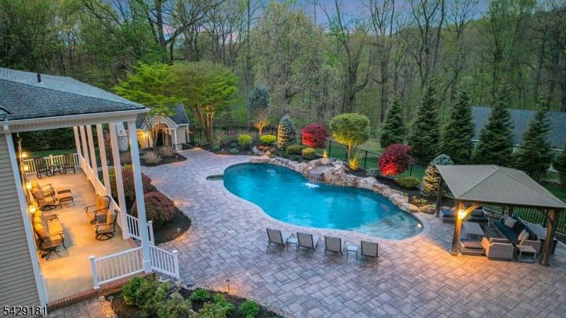 A rare offering of architectural distinction, this custom residence modeled after George Washington's Mount Vernon was designed and built by award winning builder Robert Shaw as his personal family home.