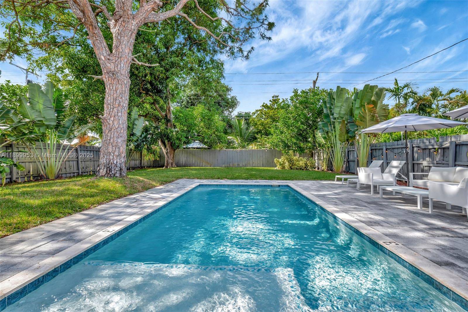 MODERN amp ; FULLY FURNISHED HEATED POOL HOME in highly desired Poinsettia Heights !