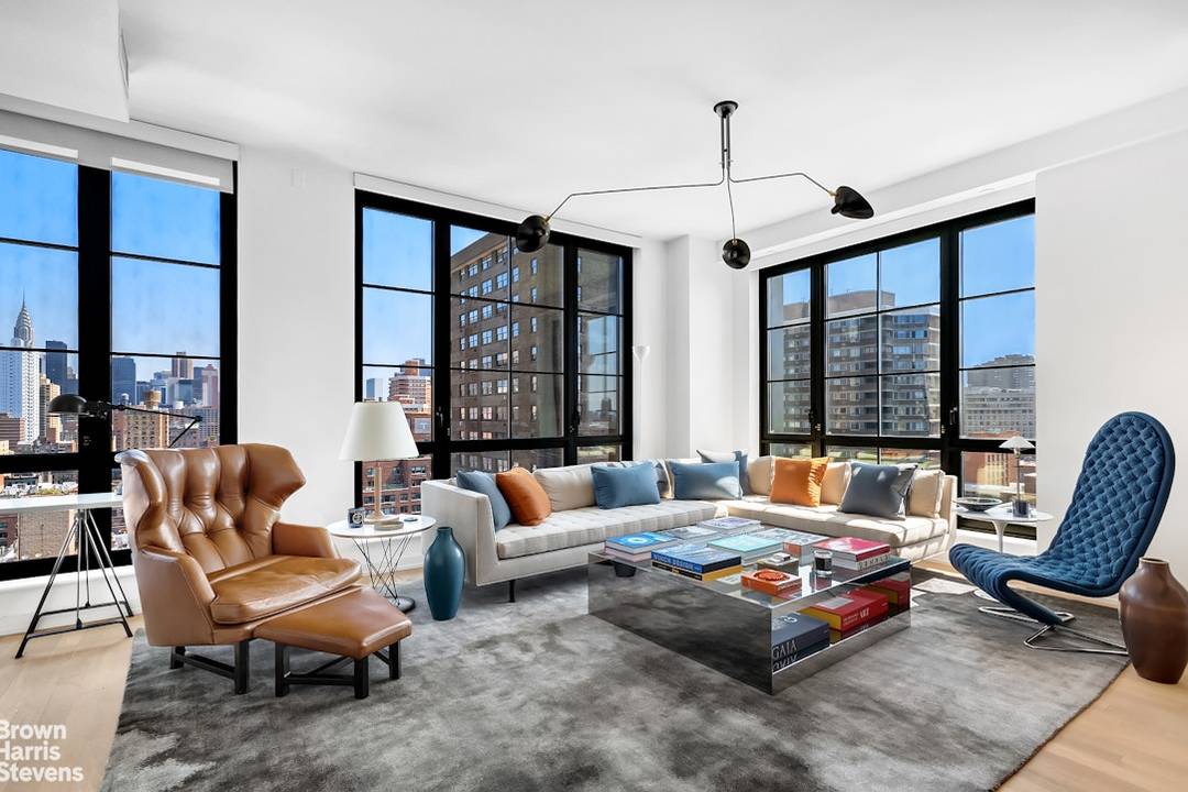 Positioned near the pinnacle of this full service, luxury condominium, unit 19A is a stunning two bedroom, two bathroom floor thru apartment with 3 exposures of panoramic casement windows framing ...