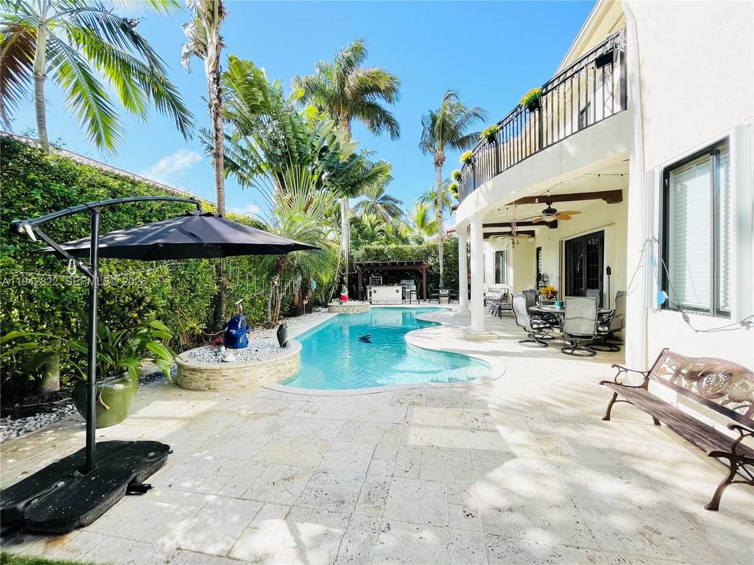 Gorgeous 5 bedroom, 4 bath residence located in the exclusive gated community of Cutler Cay.
