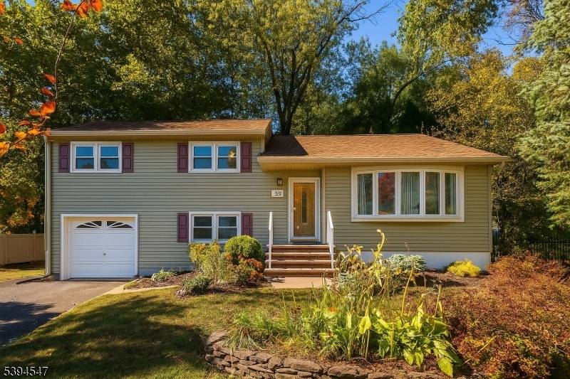 Set on an oversized lot, this bright and spacious 3 bedroom, 1 full and 1 half bath split level home offers abundant natural light and room to grow.