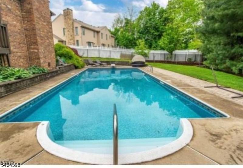 Welcome to this stunning custom brick Colonial, nestled on a private cul de sac and designed for those who demand the very best.