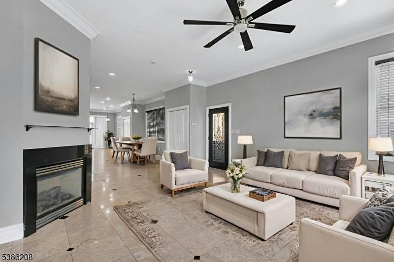 Modern three bedroom triplex townhouse situated on one of Edgewater's most desirable tree lined streets ; conveniently located within walking distance to NYC Transit Bus, ferry just minutes from parks, ...