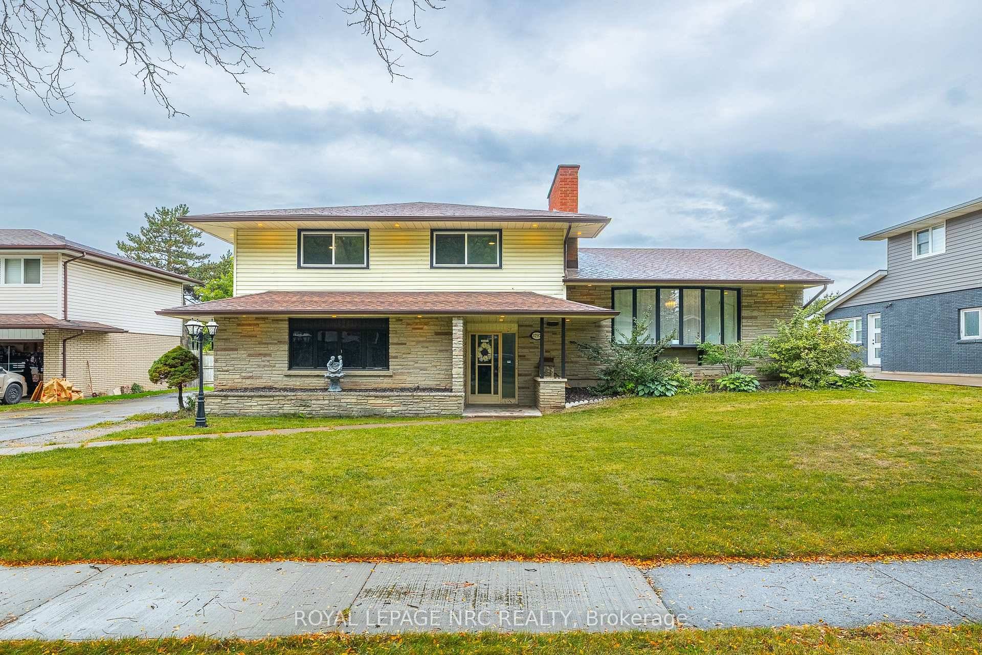 Welcome to 3797 Wiltshire Blvd, a very spacious updated modern multi level side split located in the highly sought after Rolling Acres neighbourhood on a quiet crescent.