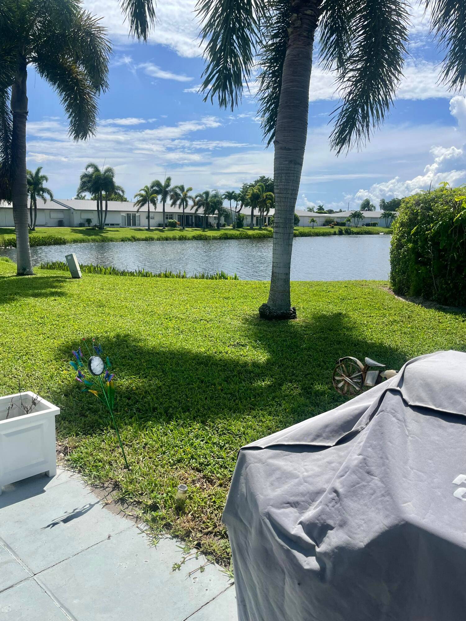 Turn Key just bring your tooth brush to this pride of ownership Villa 2 Bedroom 2 bath Grill on the Back Patio with Lovely Lake view.