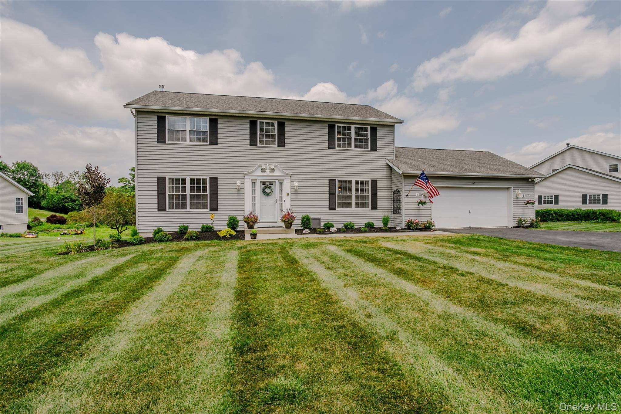 Pristine colonial located on quiet cul de sac.