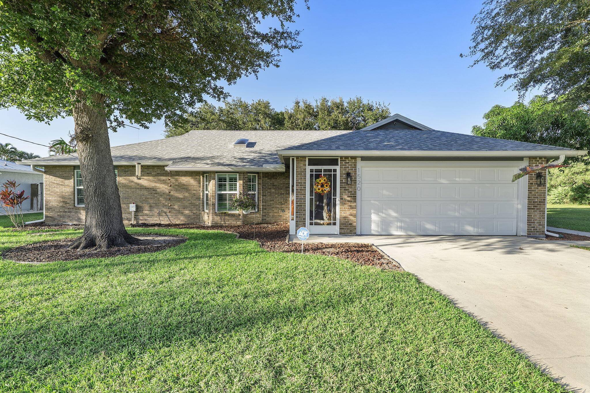 Welcome to this beautifully maintained 4 bedroom, 2 bath home in the heart of Port Saint Lucie !