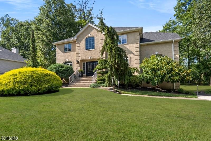 Beautifully maintained and custom built, 4 bedroom, 3.