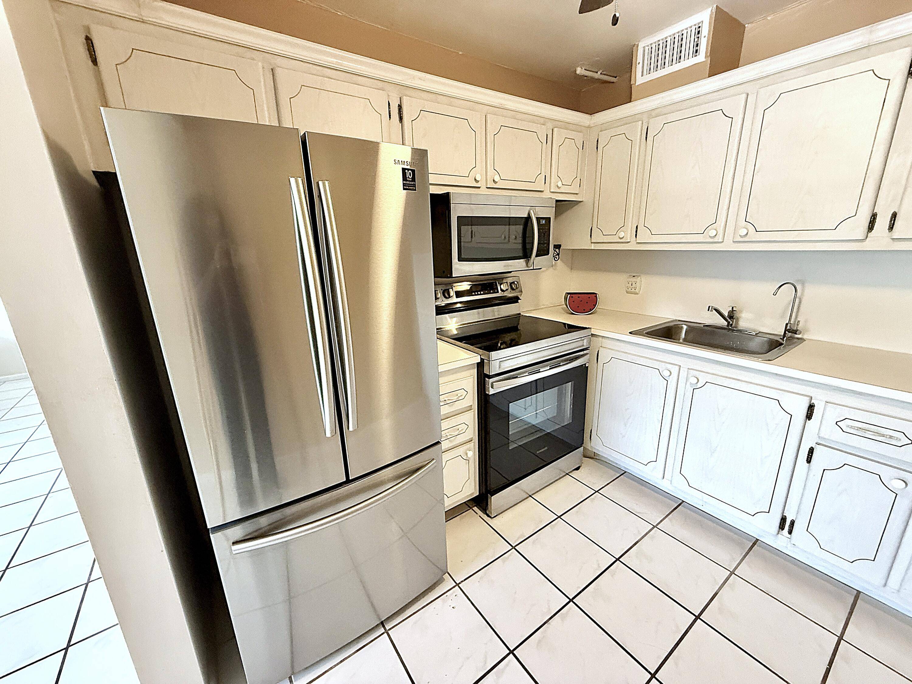 2nd Floor, Bright 2 BR 2 Full Baths w walk in shower, tile throughout.