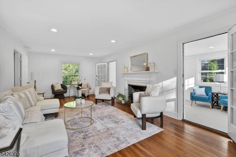 Exceptional Center Hall Colonial nestled in the highly sought after Knollwood section of Short Hills, just blocks from vibrant downtown Millburn, Midtown Direct trains to New York City, and top ...