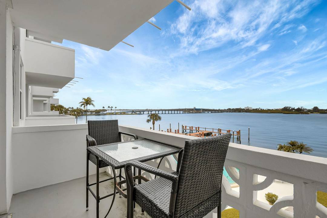 Enjoy this Pam Beach one Bedroom unit which overlooks the intercostal, pool area and boat dock.