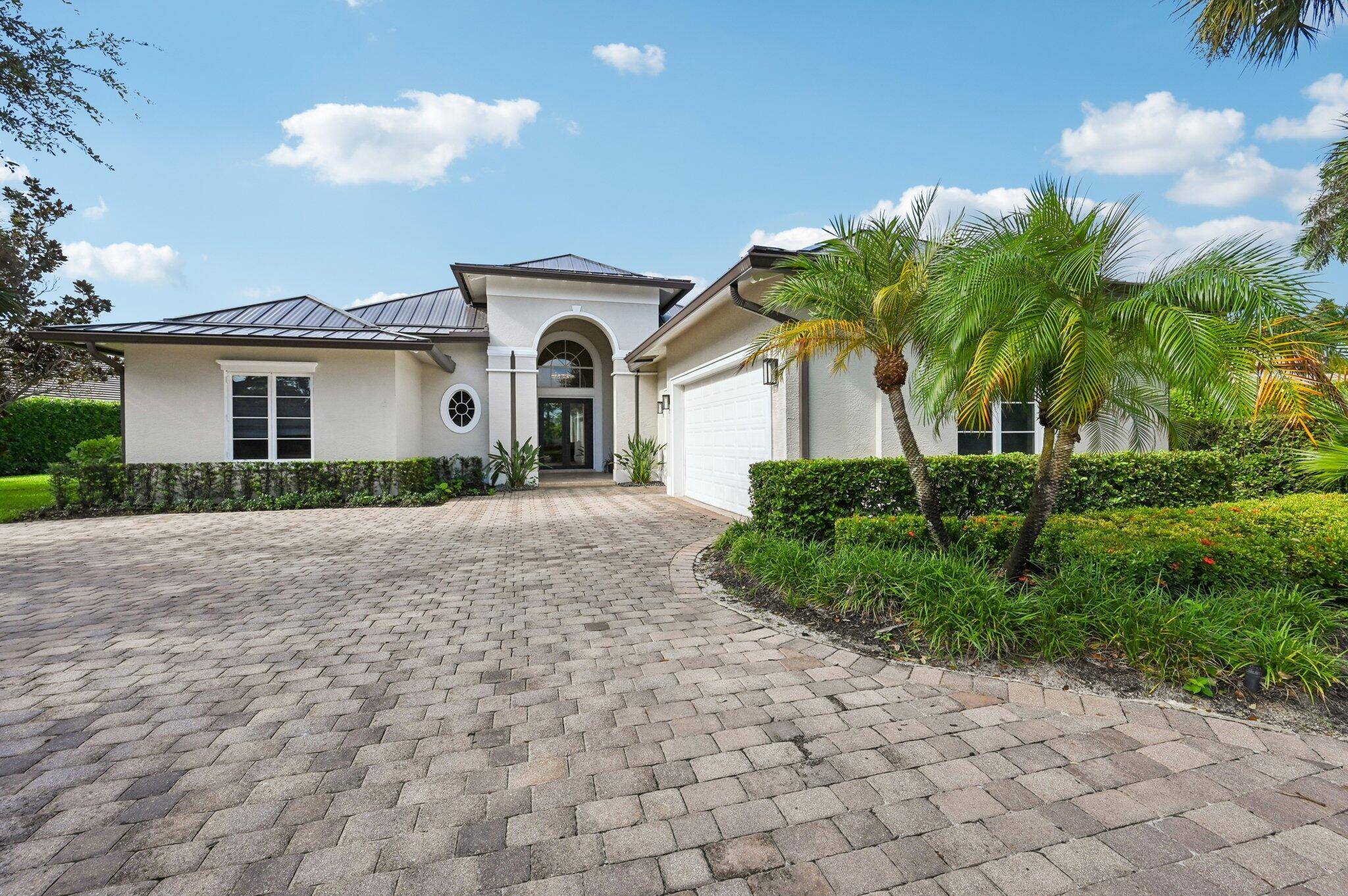 Discover resort style living in the exclusive, gated Medalist Village, surrounded by 870 acres of untouched Florida preserve.