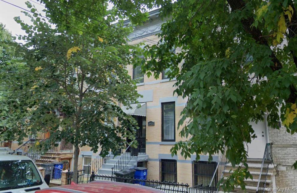 Welcome to 5932 Grove Street, 2 family brick property located on quiet tree lined street in Ridgewood