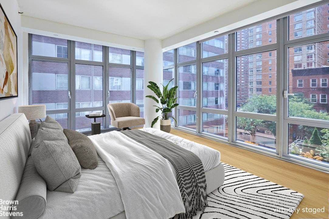 Sun Filled Corner Residence at The Link Condominium Welcome to your elegant new 2 bedroom, 2 bath corner residence at The Link Condominium with captivating views and magnificent sunsets.