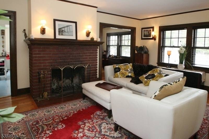 This Tudor style home is filled with character and offers a prime location close to Iris Gardens, the train station, and local parks.