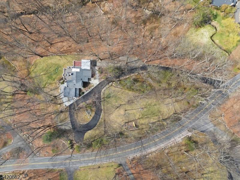 Nestled in the highly sought after Lake Valhalla section of Montville, this one of a kind Habberstad custom colonial blends timeless charm, rich history exceptional privacy on 3.