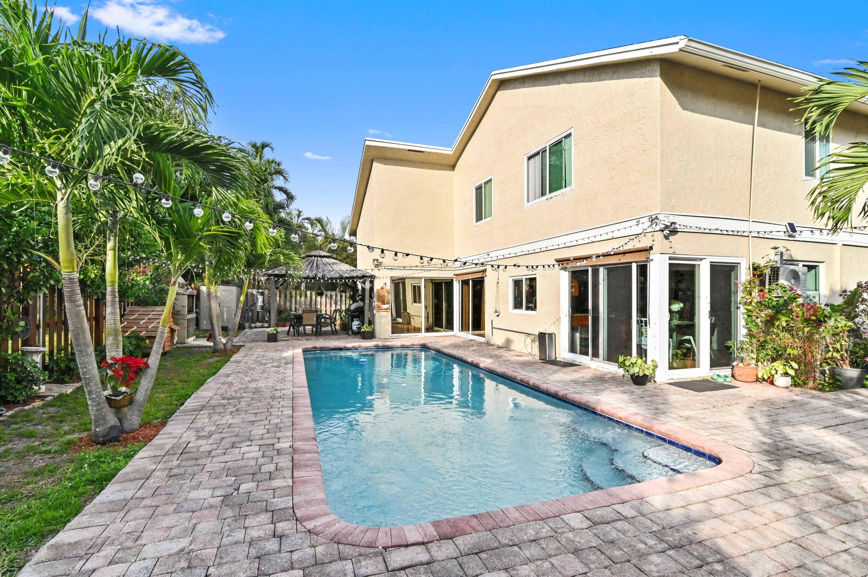 Elegantly poised on the water's edge, this two story haven is a picturesque retreat boasting 3 bedrooms, a loft, and 2.