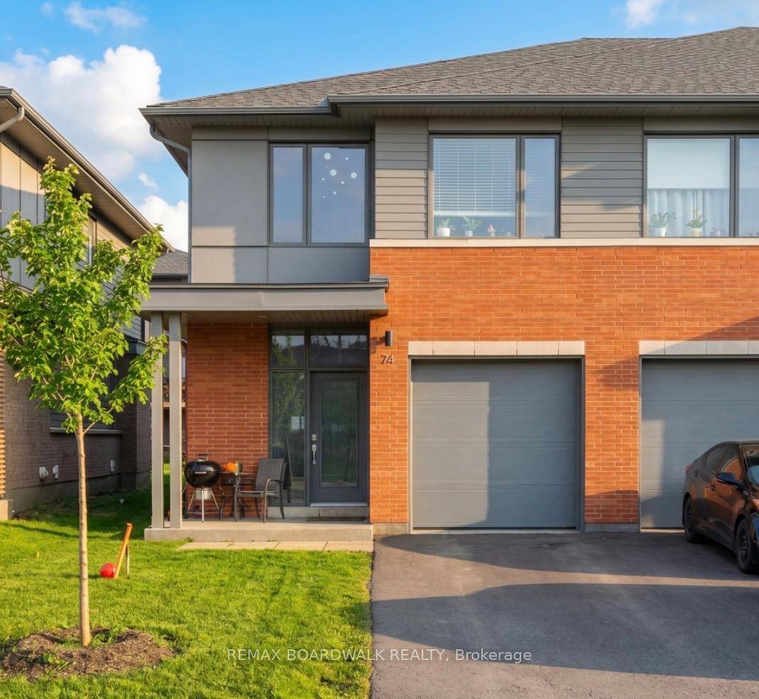 Welcome to this exquisite end unit townhome in the highly sought after community of Wateridge Village.
