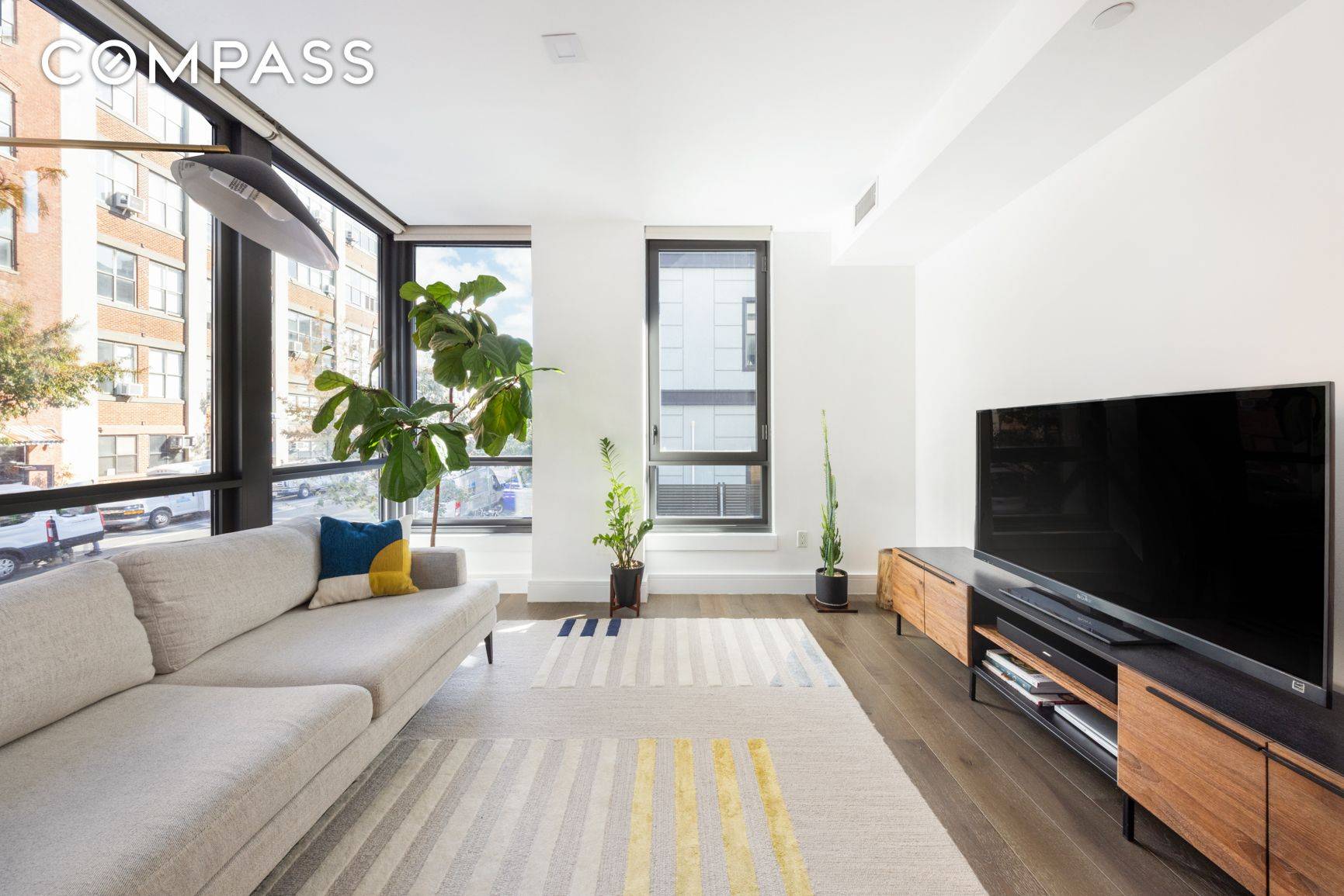 Sun Filled Corner Two Bedroom Condo with Floor to Ceiling Windows Private Parking Available Welcome to Residence 2B at 50 Greenpoint Condominium an exceptional, light filled corner home offering sweeping ...