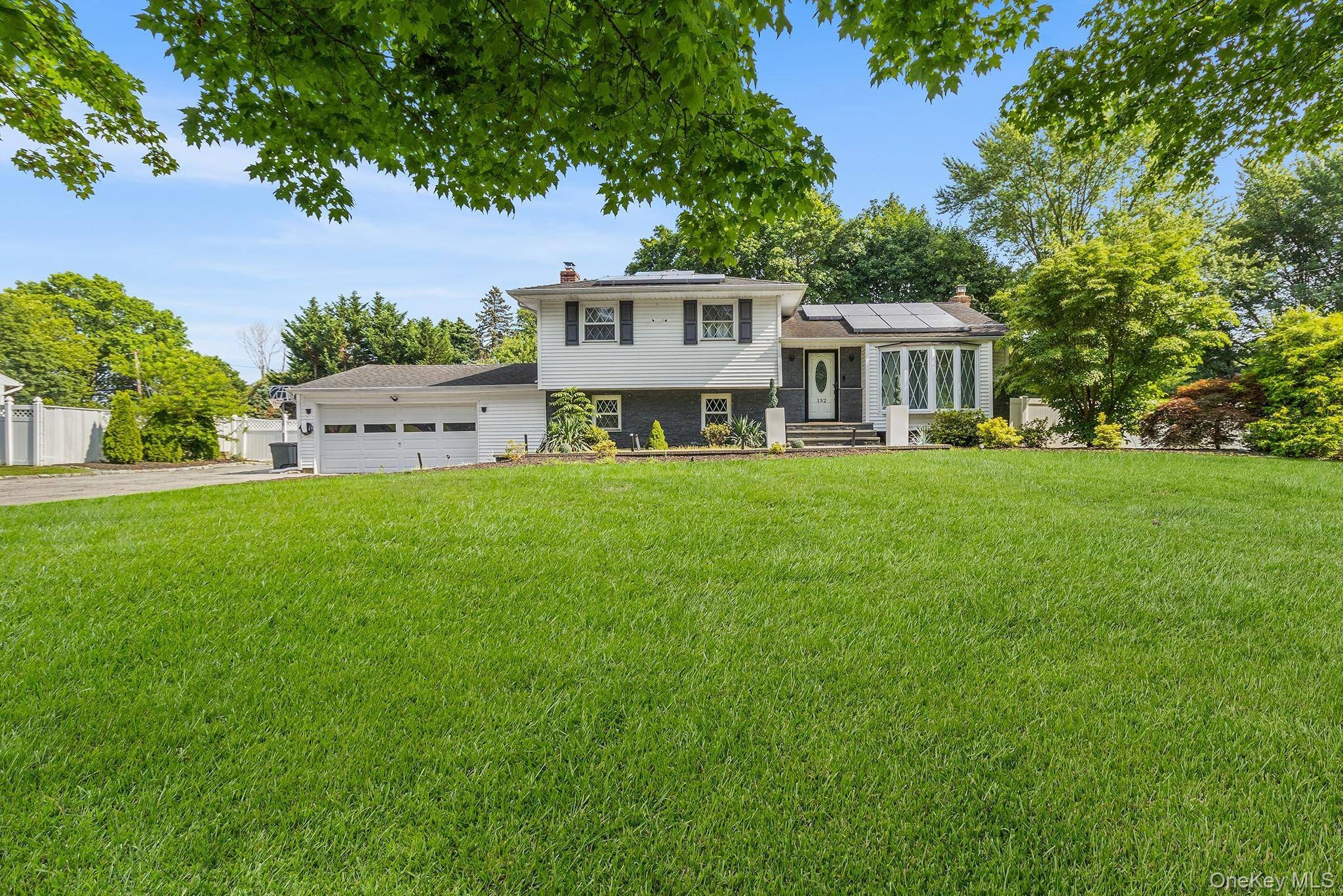 Move right in to this sun drenched split level home located in the desirable East Northport area within the award winning blue ribbon Commack School District.