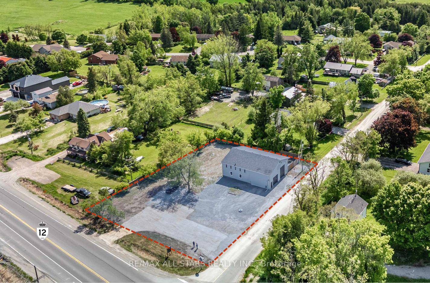 Great Freestanding Commercial Industrial Shop and Property.
