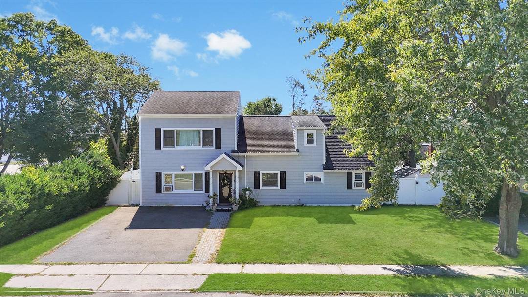 Welcome to this Classic Colonial home in Levittown, boasting exceptional space, comfort, and versatility.
