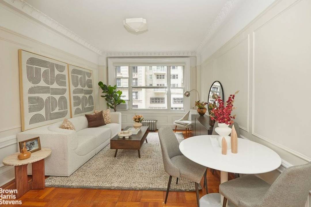 Residence 11J at 200 West 54th Street A gracious pre war two bedroom, one bathroom home offering classic character and peaceful city living.