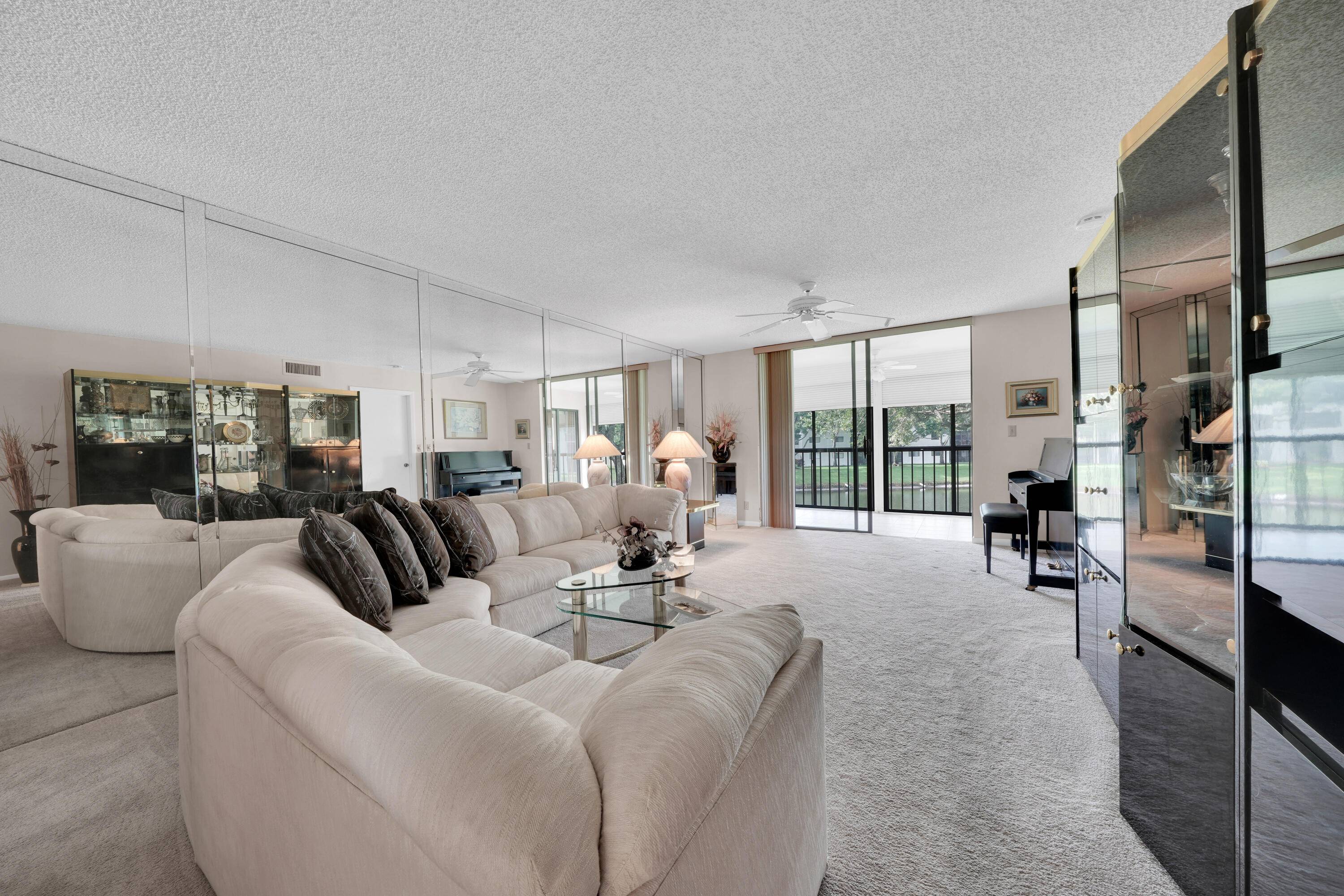 Bright, spacious, 2BR 2BA, 2nd floor condo in the much sought after, amenity packed Lakes of Delray !