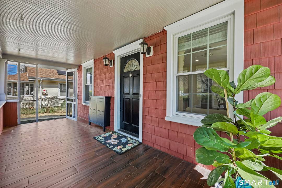 Welcome to this charming Cape Cod home nestled in Stamford's highly desirable Springdale neighborhood, where comfort, convenience, and lifestyle come together seamlessly.