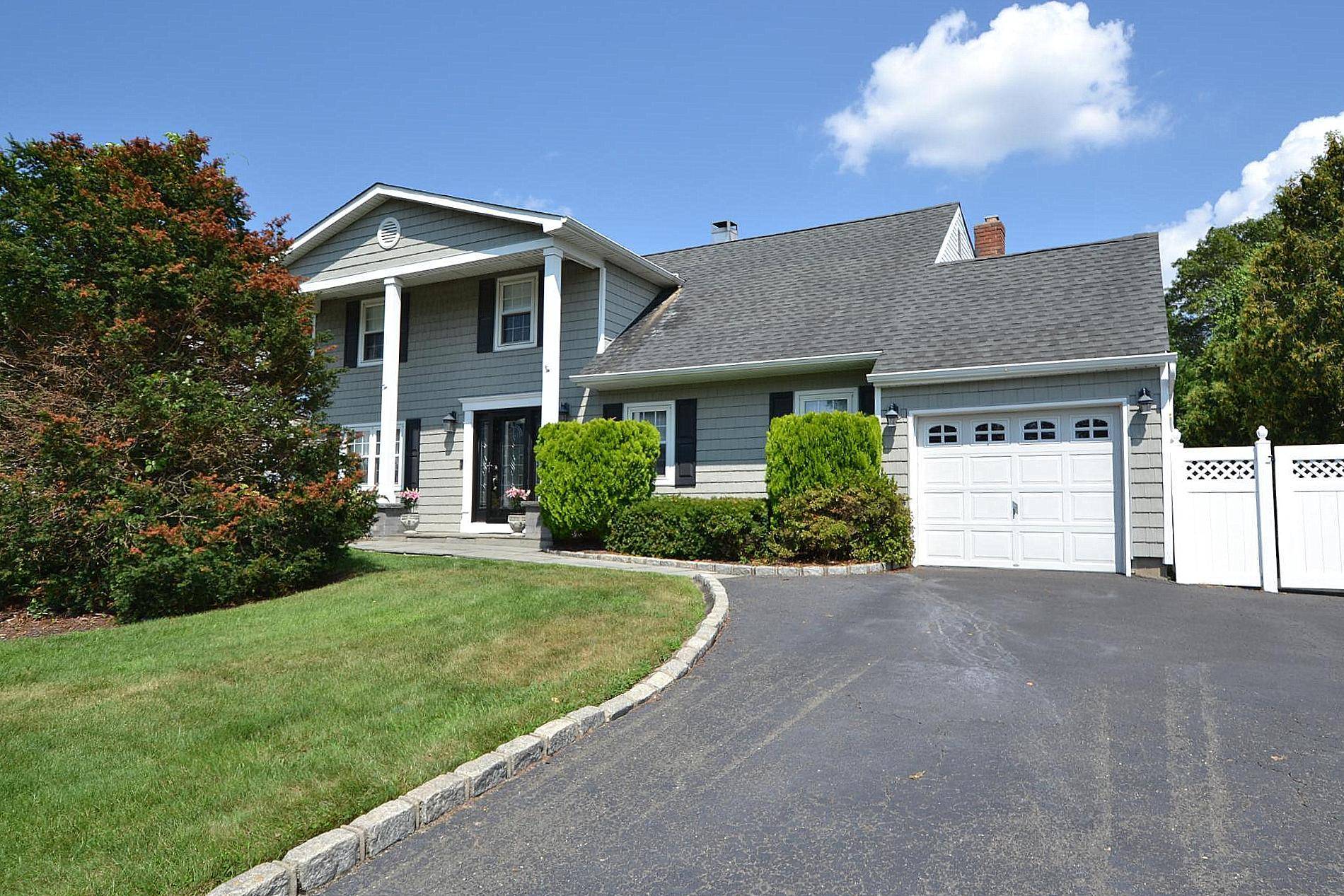 Gorgeous 4 Bedroom, 3. 5 Bath Colonial with Heated, L Shaped, Inground Pool !