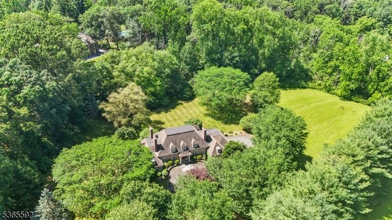 Nestled in one of New Vernon's most picturesque and sought after locations, 72 Village Road offers the perfect blend of charm, privacy, and functionality.