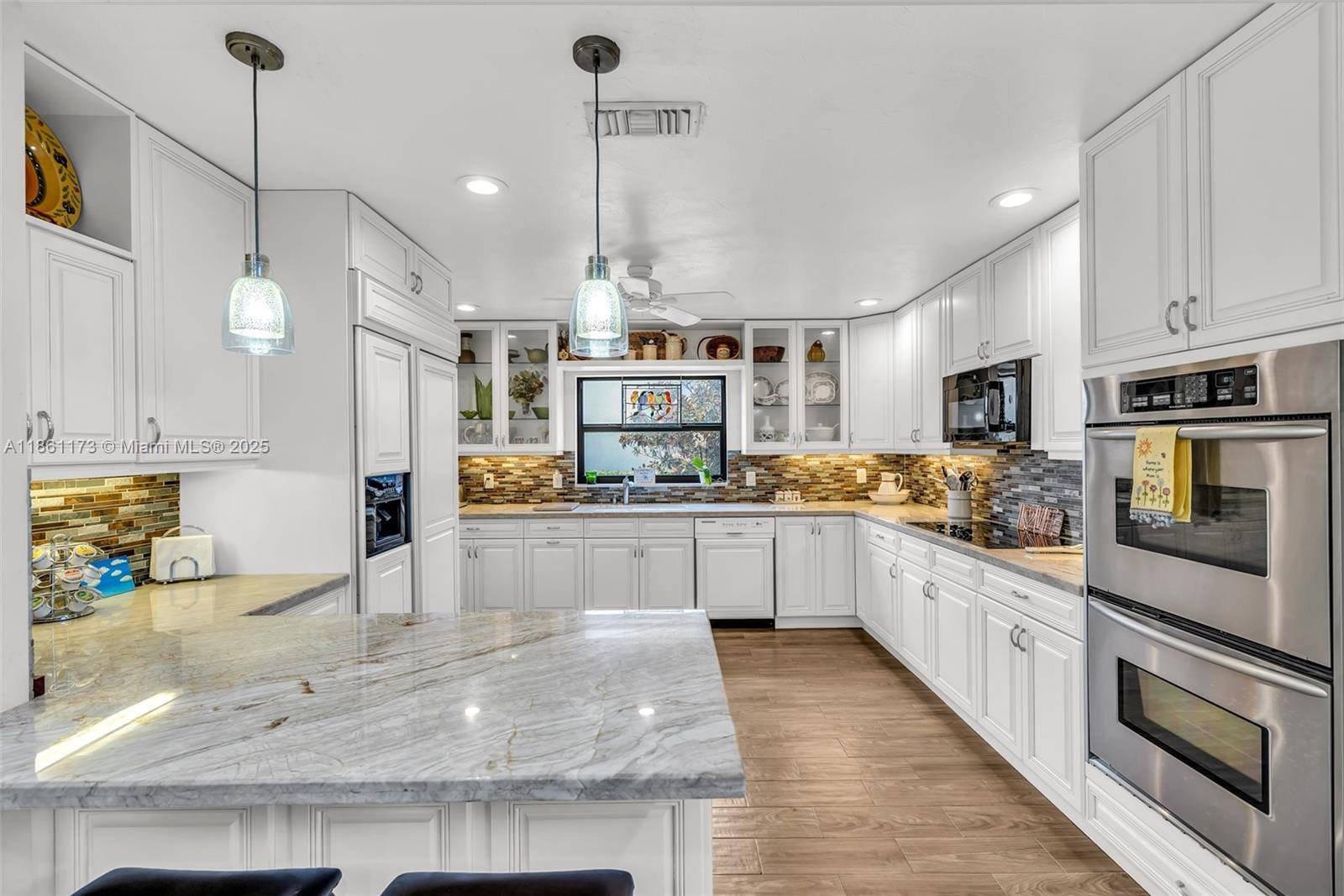 Located on a private cul de sac, this 3 bedroom, 2 bath villa in Boca Lago offers both upgrades and charm.
