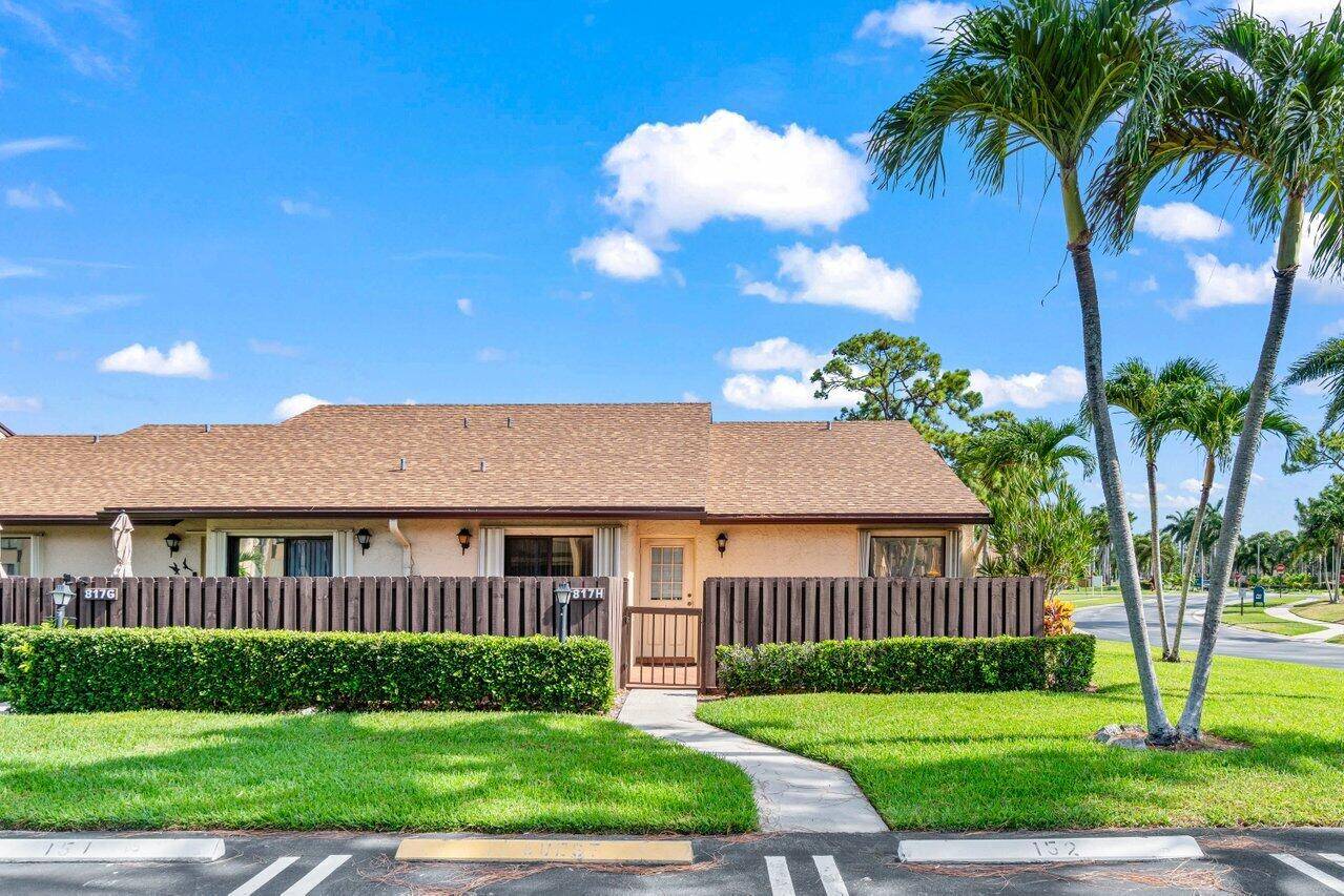 Adult 55 community. The villa featuring an open split bedroom floor plan with vaulted ceilings and generous natural light.