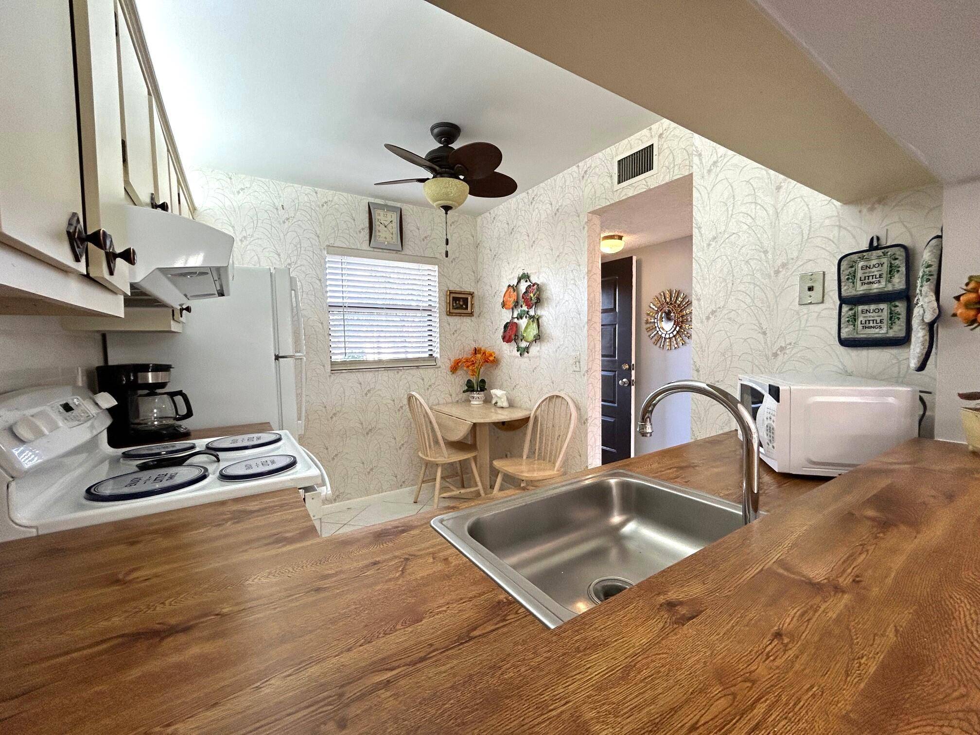 Nicely maintained 2 bedroom 2 bath condo located directly across from the pool and clubhouse.
