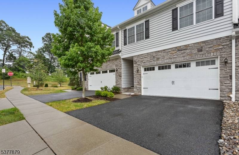 Built in 2019, this stunning townhome is located in the highly sought after Residences at Columbia Park.