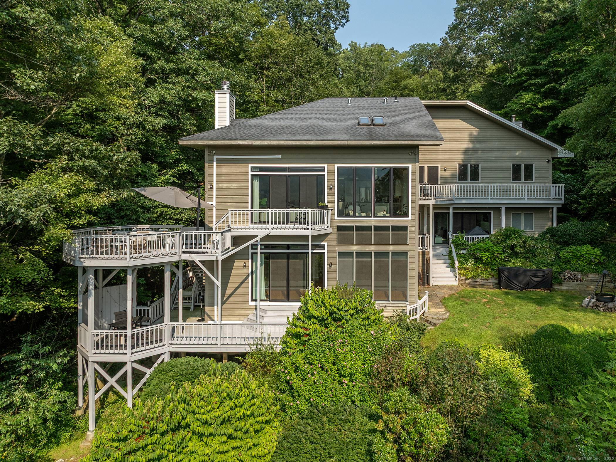 Enjoy breathtaking sunsets from your fully renovated contemporary waterfront retreat !