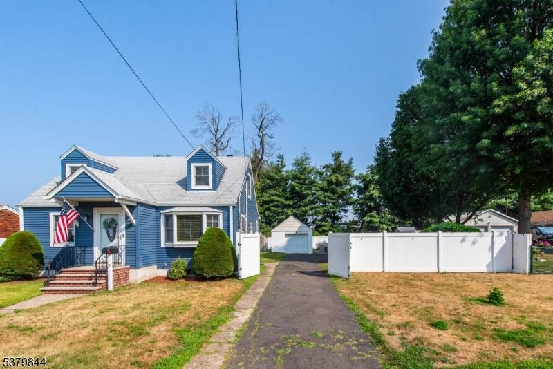 Welcome to 33 Martha Ave, a beautifully maintained Cape Cod offering 3 bedrooms and 1 full bath, perfectly situated on an oversized lot in one of Elmwood's most desirable neighborhoods.